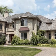 bigstock-Luxury-Stone-Home-With-Turret-12568412